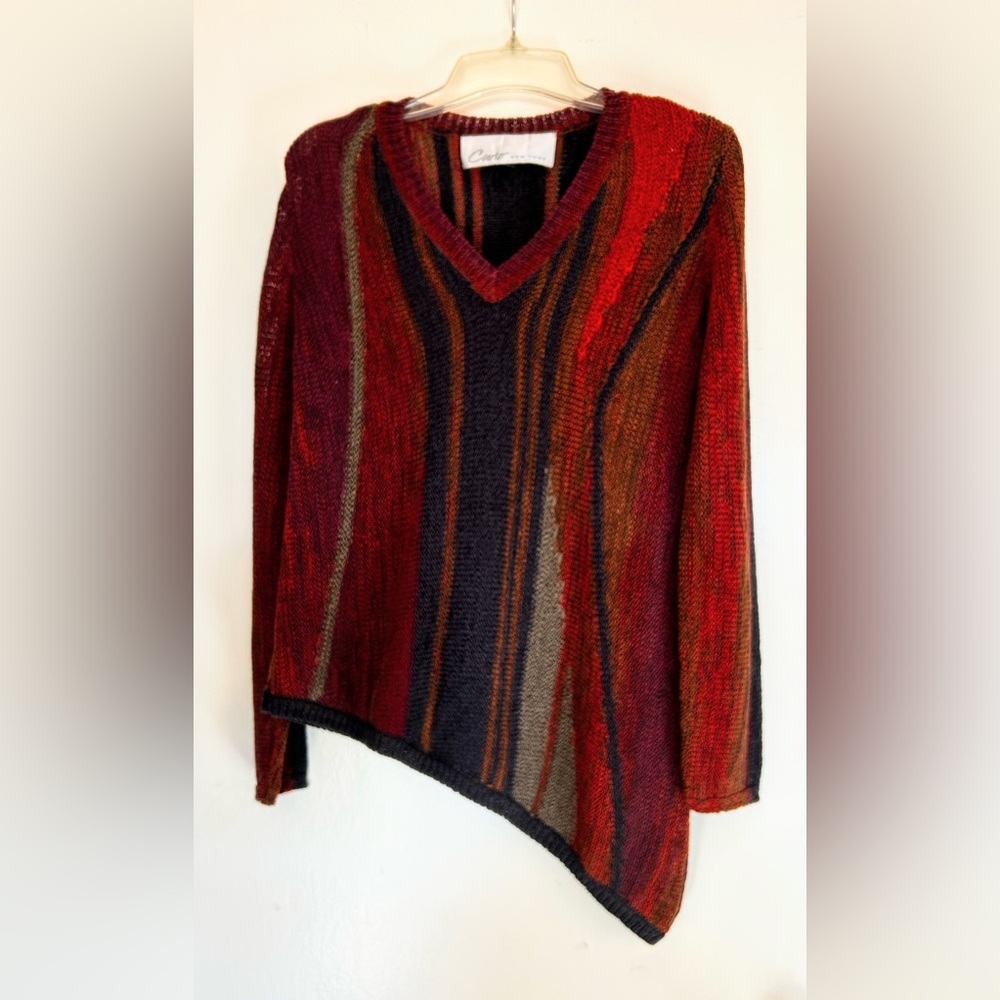 Curio New York Asymmetrical Hem V-Neck Sweater.